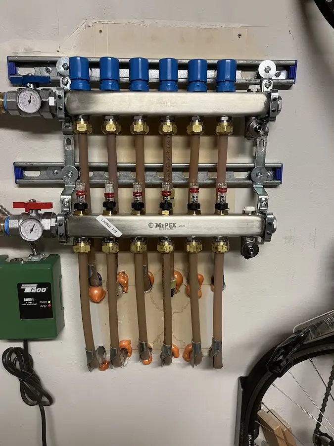 Plumber performing Water Heater Repair at a residential property in Wahpeton